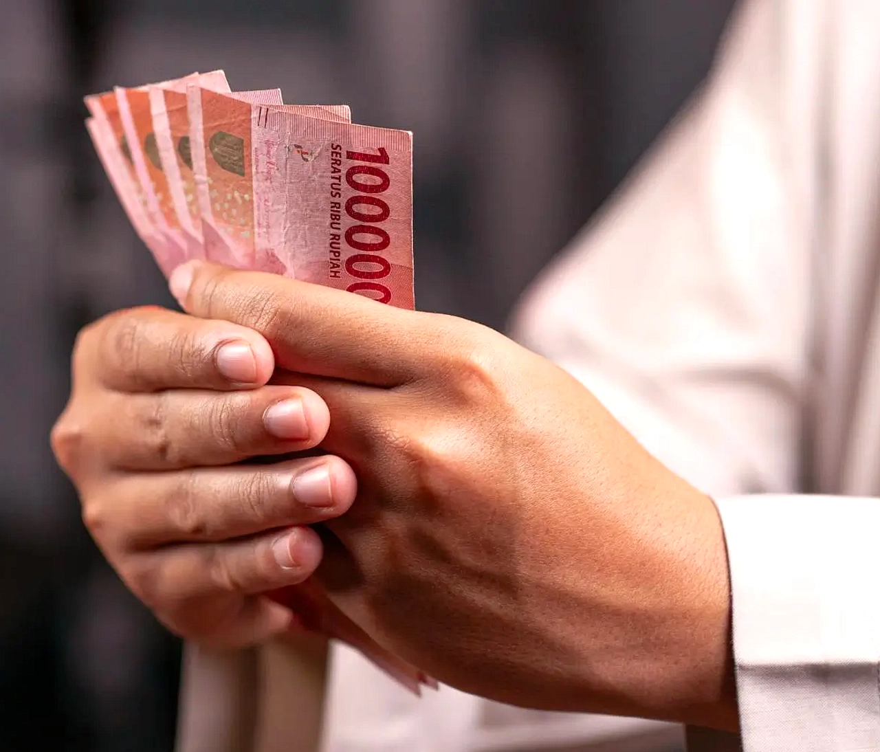 Dollar AS Turun 0,75% Pasar Rupiah Kenaikan BI Rate di Pasar