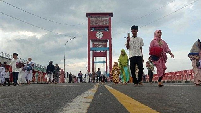 Tren Lip‑Sync Jembatan Ampera Bikin Lagu 2019 Populer Lagi